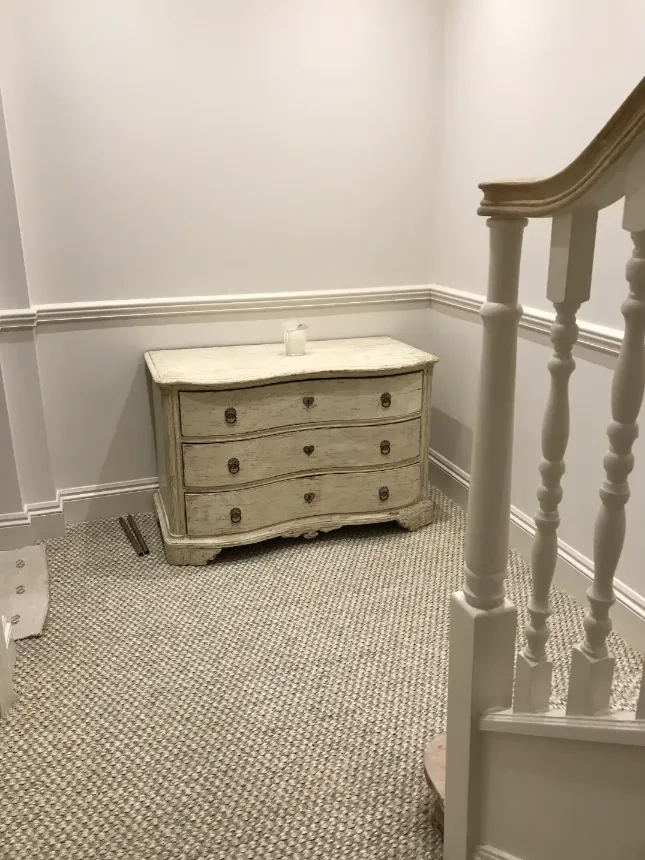 stairs and antique cupboard wid drawers 