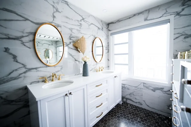 Bathroom,tiles like marble,window.image light